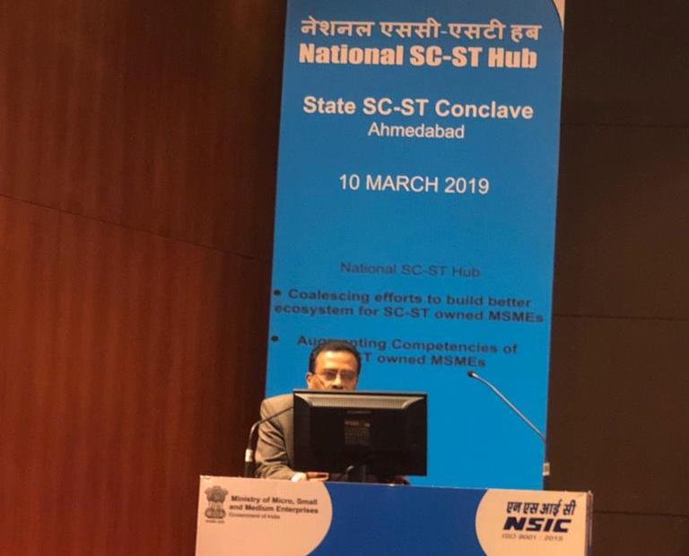 National Small Industries Corporation Limited, Branch Office Ahmedabad organised a SC-ST Conclave on 10th March 2019 at Entrepreneurship Development Institute of India (EDII), Village Bhat, Gandhinagar to bring together, for the State of Gujarat CPSEs, Banks, Industry Associations and State Government on a common platform and deliberate upon steps to be taken to fulfil the mandate of Public Procurement Policy for SC-ST entrepreneurs and also to build their capacities. In order to work for the entrepreneurs from the SC/ST community ,Ministry of MSME invited all stakeholders to this conclave for deliberations with a view to reach the last mile for delivery of benefits of NSSH Scheme.
Sh. P. Udayakumar, Director (Planning and Marketing) NSIC was the key note speaker, Sh. H. D. Shrimali, Additional Industries Commissioner. Govt. of Gujarat, Sh. Satish Parmar, President  DICCI Gujarat Chapter, Sh. P.K. Jha – ZGM NSIC, Central spoke in the programme. More than 200  SC-ST participants participated from far backward areas on Palanpur, Mehsana, Baroda, Navrsari and Ahmedabad to know the benefits formulated by ministry to SC/ST Entrepreneurs. Directory of SC/ST entrepreneurs of Gujarat was also released during the program.

Senior officers from ISRO, IOCL, Banks, Airport Authority of India and Western Railway Corporation were present from the CPSE. Industry Associations, Financial Institutions, and Central PSEs  also attended the Conclave and assured to extend cooperation with State Govt, and support SC/ST HUB.
The program has received a vide media publicity both on electronic and print media.  Door Darshan News (DD Girnar) and GTV News (Gujarat TV)  has also give a  coverage to this event and more than a  dozen daily local vernacular and Indian Express has also given good coverage of this program. 

