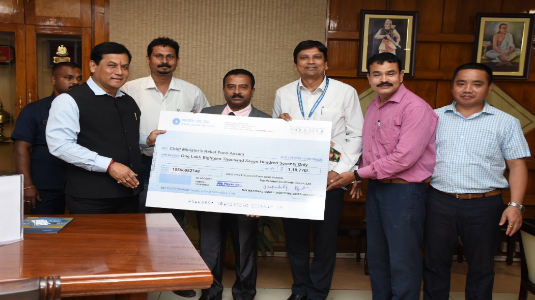 NSIC employees of Guwahati in support from other branches and individuals across the country donated a sum of Rs. 1.19 lakh to the Chief Minister’s Relief Fund Assam on 7th September, 2019. 
Sri P. Udayakumar, Director (P&M) handed over the cheque to Sri Sarbananda Sonowal, Chief Minister of Assam in presence of Dr. Avinash Choudhary, ZGM, (North East). Chief Minister of Assam thanked for the generous contribution by the employees of NSIC and requested for continued support for the development of the state. 
The above contribution received from Mr. P. Udayakumar, Director(P&M), Mr. T. Venkateswarn, ZGM, BO Coimbatore, BO Madurai, NTSC Howrah, BO Pondicherry, NTSC Hyderabad, BO Bangalore, BO Vijaywara, BO Cochin, EMDBP Hyderabad, BO Naini, BO Balanagar, Hyderabad, BO Nashik, BO Hyderabad, BO Salt Lake, BO Dehradun, BO Jamshedpur,  NSSH, Shillong, Sajib Sarma,CM,HO, and individuals - Jayanta Sarma, Angshuman Choudhury, Arunav Sarmah, Bhupen Boro, Punam Swargiary, Muluk Raj Goyari, Moni Das, Ram Gian Harijan, Bani Devi, Dibyajyoti Nath, Chandana Deka Nath. NSIC BO Guwahati hereby express heartfelt gratitude for the contributions made by above branches, individuals and look forward for similar cooperation in days to come.
