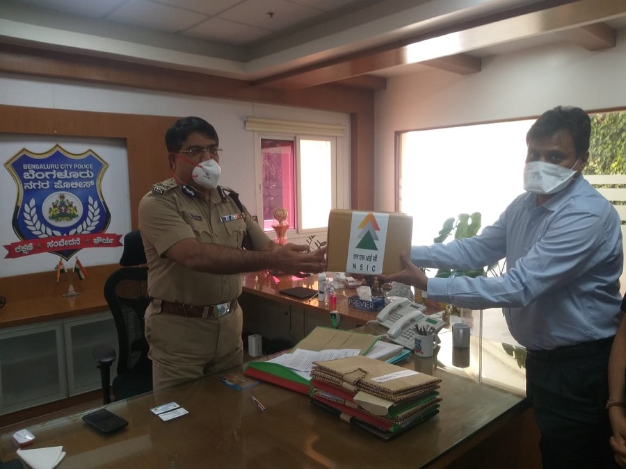 Sri Bhaskar Rao, IPS, Commissioner of Police, Bengaluru was handed over the Masks and Sanitizers for distribution by NSIC to join the fight against COVID-19. This NSIC initiative under CSR was taken by Shri P. Ravi Kumar, CGM, South-I, NSIC (Bangalore).