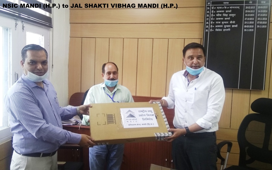 In continuation of Nation's fight with COVID19, officers of Mandi (H.P.) office of The National Small Industries Corporation Ltd. (NSIC) Sh. Lokesh Bhatia (Dy. Manager) & staff provided Face Masks and Hand Gloves to JAL SHAKTI VIBHAG MANDI (H.P.) Er. Upender Vaidya, Superintending Engineer (SE- Jal Shakti Vibhag Mandi), in Presence of Er. Vivek Hajri (Exec.Engg.), Er. Rajneesh Onkar (Asstt.Engg), Er. Bhanu Pratap Pathania (Asstt. Engg) and Mr. Ramesh Chand (Supdt.)at JAL SHAKTI VIBHAG Office, Tarna Mandi (H.P.) for distribution to frontline workers of their department.