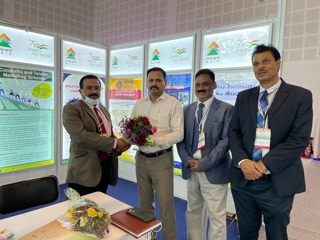 Shri Ranjit Kumar, IAS Commissioner Bureau of Public Enterprises, Government of Gujarat being welcomed by Shri P. Udayakumar, Director (P&M) at the NSIC stand in the exhibition on “Nation Building and CPSEs” on 09th June, 2022. During his visit he showed keen interest in signing MoU with NSIC for the mutual benefit of MSME stakeholders of both the organizations. Also seen in the picture are Shri Manoj Lal, Chief General Manager and Shri P.K. Jha, CGM (Zonal Head Central), NSIC. 