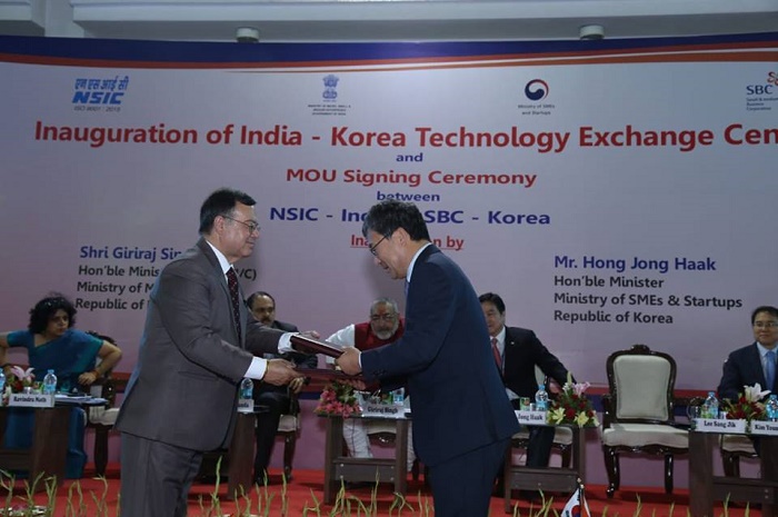 NSIC signed an MOU with Small Business Corporation (SBC) of South Korea to facilitate, assist and provide necessary support to MSMEs of both the countries to identify & exchange latest technologies, share management expertise, Product development, technology applications for productive development coinciding with the inauguration of Indo Korea Technology Exchange Centre at NSIC campus ,Okhla Industrial Estate,New Delhi. The MOU was signed by Shri Ravindra Nath,CMD,NSIC and Mr. Lee Sang Jik  Chairman of Small Business Corporation(SBC) , South Korea in the presence of Shri Giriraj Singh,Hon’ble Minister of State (Independent Charge), Ministry of Micro, Small and Medium Enterprises and Mr. Hong Jong Haak, the Hon’ble Minister of SMEs and Start-ups of Republic of Korea . Dr A.K.Panda ,Secretary ,MSME and Ms. Alka Nangia Arora,Joint Secretary, MSME, Shri P.Udayakumar, Director(P&M),Shri A.K.Mittal ,Director(Fin), NSIC alongwith senior officers of Ministry of MSME and NSIC were also present 