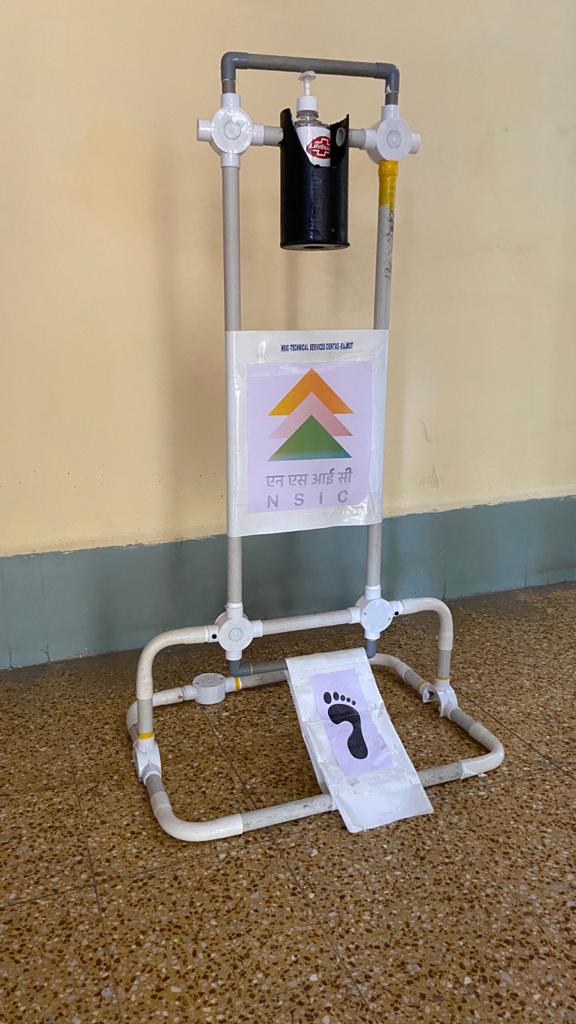 
NSIC Technical Services Centre (NTSC), Rajkot has developed foot operated sanitiser dispensers as part of its efforts to bolster in breaking the chain of COVID 19 pandemic. The sanitiser dispensers could be deployed at Offices, Markets, Malls, Railway Stations, Bus Stand, Hospitals, Colleges, Multi Store, Residential Complexes and MSME units etc. The overall size is 20 inch X 18 inch X44 inch(LXBXH) and the equipment cost is Rs 1800/ + GST approximately. Apart from this, transport charge will be extra.
