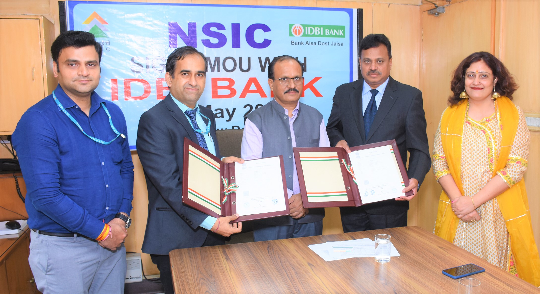 NSIC signs MoU with IDBI Bank on 12.05.2022 at New Delhi for establishing a strategic partnership to support MSMEs with their credit requirements under its Bank credit facilitation scheme. The MoU was signed by Sh. P Ravi Kumar, Chief General Manager, NSIC and Sh. Manoj Kumar, General Manager Credit solutions, IDBI Bank in the presence of Sh. G.Dixit,  Director (Finance), NSIC. Also present on the occasion was Ms Himani Shali, Chief Manager (Bank Tie Up), NSIC and Sh. Santosh Kumar, DGM, IDBI bank.
