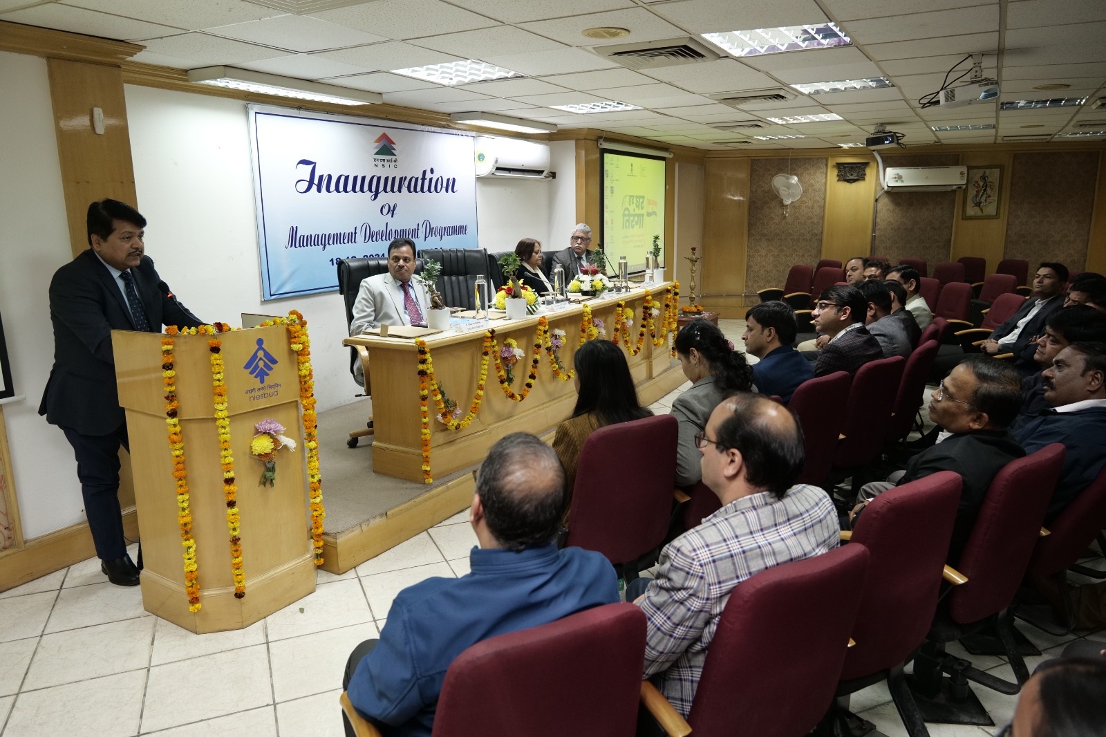 NSIC conducted its residential 2nd Management Development Program (MDP) for 30 employees from across India. The Program was inaugurated by Dr. Subhransu Sekhar Acharya, CMD of NSIC in the presence of Dr. Poonam Sinha, Director (NIESBUD), Sh. P. Ravi Kumar, ED (NSIC) and Mr. Sunil Tyagi, SGM (NSIC). The residential program took place at the National Institute of Entrepreneurship and Small Business Development (NEISBUD), Noida, from December 18-21, 2024. During the inauguration, Dr. Acharya addressed the participants with an inspiring and motivational message. He emphasized the importance of continuous learning and growth, urging the participants to actively apply the knowledge and skills gained during the program to enhance their performance in their respective work areas.