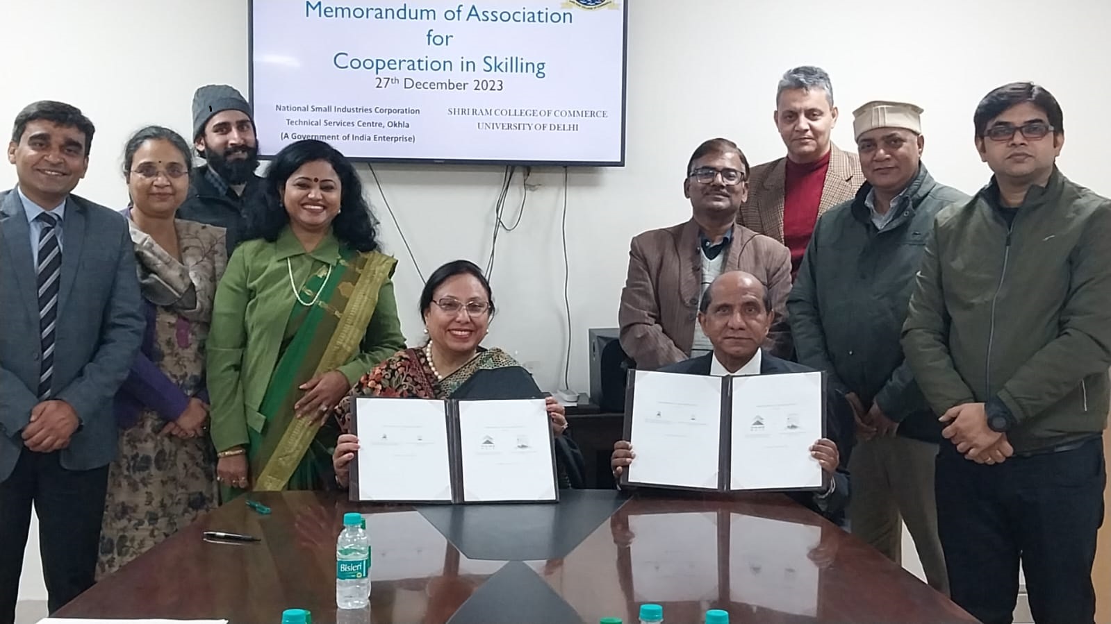 NSIC Technical Services Centre (Okhla), signed Memorandum of Association with Shri Ram College of Commerce (SRCC) on 27th December 2023.  SRCC is one of the premier colleges of Delhi University for cooperation in skilling of Delhi University students for Skills training programmes in the latest in-demand skills that would benefit their careers as working professionals, corporate employees or entrepreneurs by up-grading their expertise. The candidates would be introduced to various technology and business skills. Training would be conducted in contemporary courses such as Use of ChatGPT and Aritificial Intelligence in Business, Marketing and commerce. Data Analysis and visualization using Excel, for decision making, etc. Prof. (Dr.) Simrit Kaur, Principal of SRCC expressed her enthusiasm on use of technological tools in entrepreneurship and opportunities for students. Sh. Subodh Jaiswal, SGM and Centre Head, NTSC (Okhla) appraised about Centre activities and advised that SRCC participants should take full advantage of the resources and opportunities. Prof. (Dr.)Aruna Jha, Vice Principal and Asst. Professors of SRCC were also present on the occasion courses would be conducted in NTSC Okhla as well as in SRCC campus based on mutual agreement. This association would go a long way in addressing the market oriented skills requirement of the youth and would provide them exposure to the latest technologies being used worldwide.
